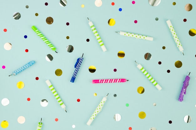 Free Photo colorful birthday candles and confetti background
