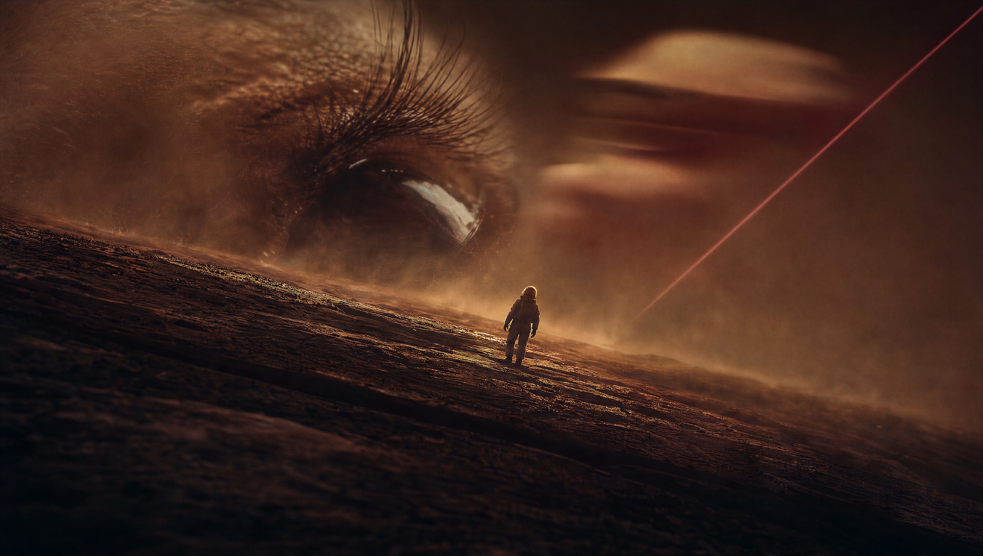 Lone figure crossing a dune beneath a giant eye in a hazy sky